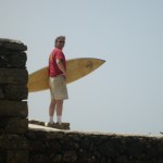 Bill holding surfboard
